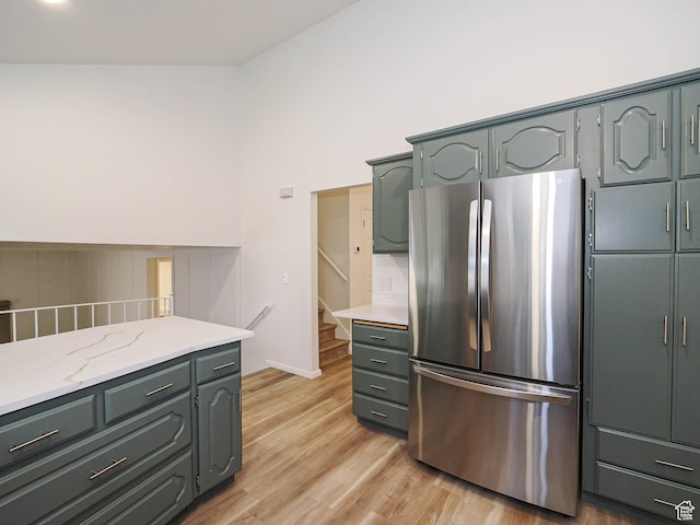 9971 S Borg Dr, Sandy, UT 84092 - kitchen with freestanding refrigerator and light wood-type flooring