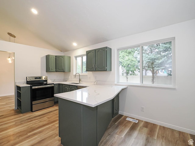 9971 S Borg Dr, Sandy, UT 84092 - kitchen featuring stainless steel electric range, a peninsula, green cabinetry, light wood-style floors, and lofted ceiling