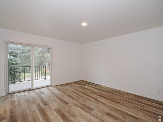 9971 S Borg Dr, Sandy, UT 84092 - unfurnished room with light wood-style flooring and recessed lighting