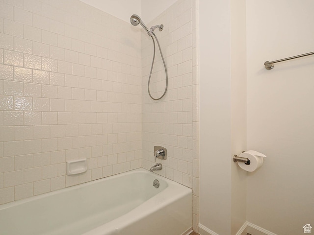 9971 S Borg Dr, Sandy, UT 84092 - full bathroom featuring baseboards and shower / washtub combination