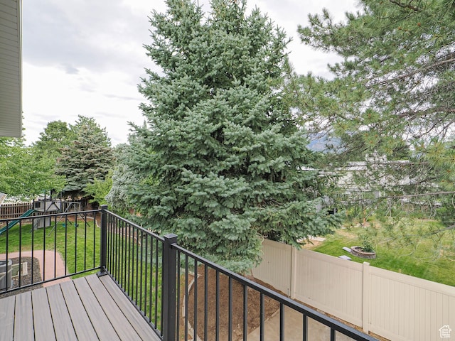 9971 S Borg Dr, Sandy, UT 84092 - wooden deck featuring a playground