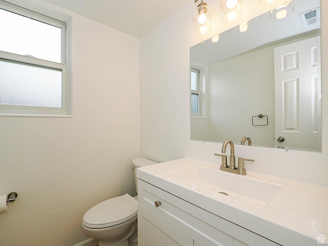 9971 S Borg Dr, Sandy, UT 84092 - half bathroom featuring vanity and toilet