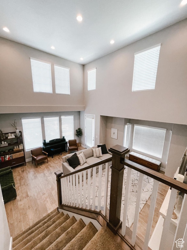 144 W 3430 N, Lehi, UT 84043 - stairs with wood finished floors, a high ceiling, and recessed lighting