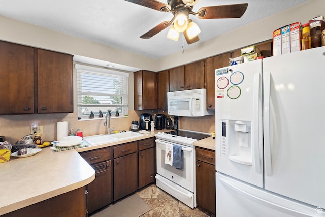 1602 S 550 W, Woods Cross, UT 84087 - kitchen featuring white appliances, light countertops, a ceiling fan, and dark brown cabinets