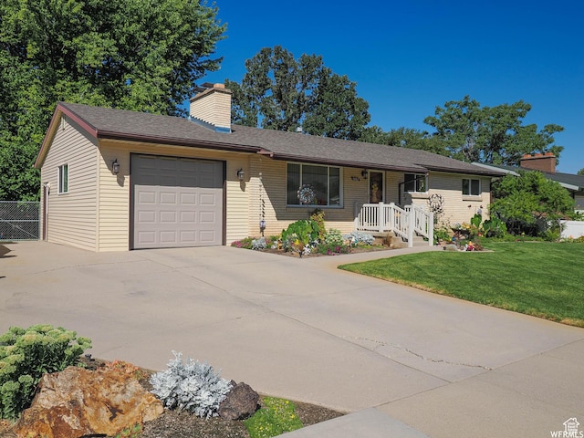 1602 S 550 W, Woods Cross, UT 84087 - ranch-style home featuring a garage, driveway, and a chimney