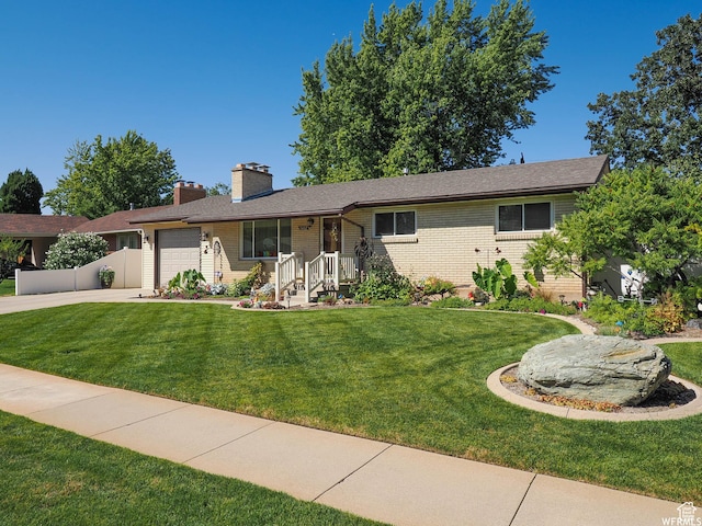1602 S 550 W, Woods Cross, UT 84087 - single story home with an attached garage, a front lawn, driveway, and a chimney