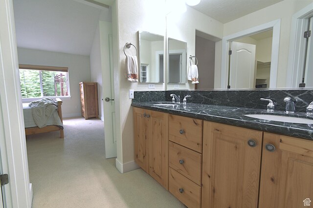 5133 N Cove Canyon Dr Unit 200, Park City, UT 84098 - ensuite bathroom with double vanity and baseboards