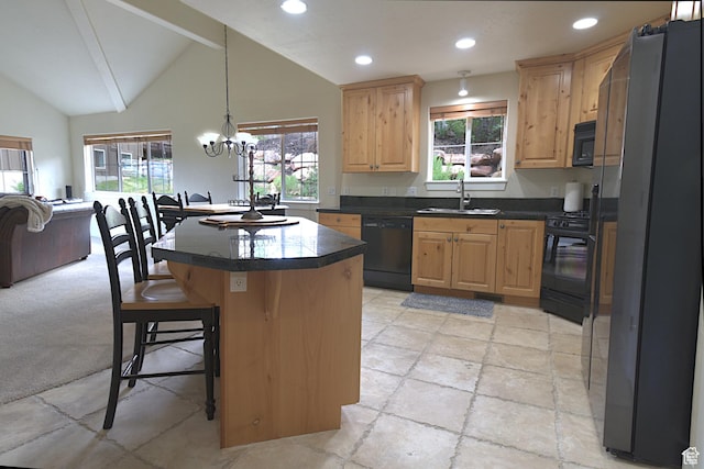 5133 N Cove Canyon Dr Unit 200, Park City, UT 84098 - kitchen featuring black appliances, light brown cabinetry, dark countertops, a kitchen bar, and vaulted ceiling
