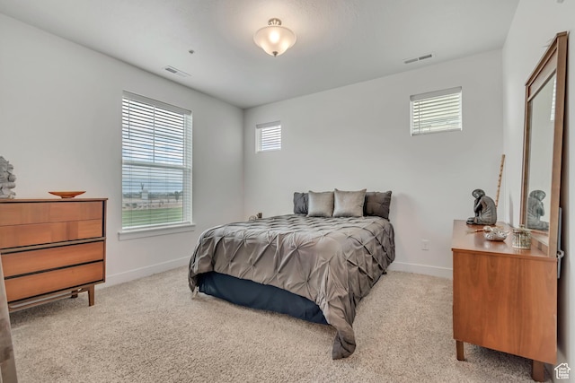 1382 N 3650 W Unit V101, Lehi, UT 84043 - bedroom with baseboards and light carpet
