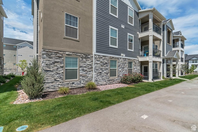 1382 N 3650 W Unit V101, Lehi, UT 84043 - view of front of house featuring stone siding