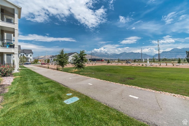 1382 N 3650 W Unit V101, Lehi, UT 84043 - surrounding community with a mountain view and a lawn