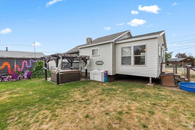 670 E 400 S, Payson, UT 84651 - rear view of property with a pergola, a hot tub, and a lawn