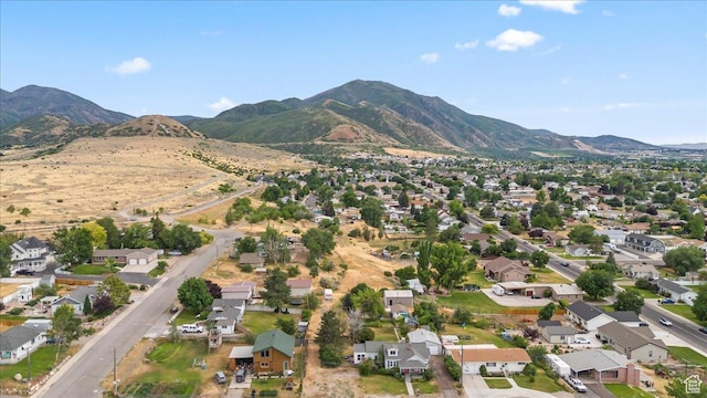 670 E 400 S, Payson, UT 84651 - aerial overview of property's location with nearby suburban area and a mountainous background