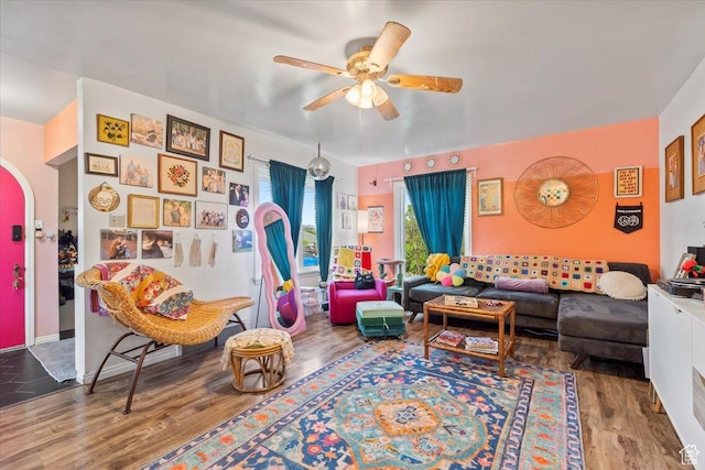 670 E 400 S, Payson, UT 84651 - living room with a ceiling fan, wood finished floors, and arched walkways