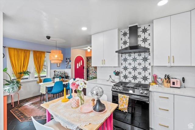 670 E 400 S, Payson, UT 84651 - kitchen with stainless steel range with gas stovetop, wall chimney exhaust hood, light countertops, backsplash, and recessed lighting