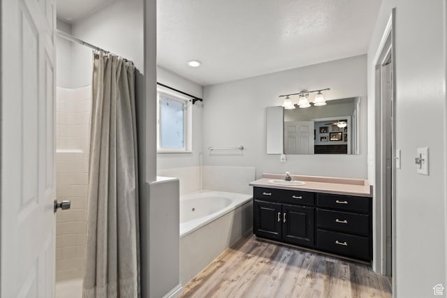 528 W 650 S, Richfield, UT 84701 - bathroom with a bath, vanity, wood finished floors, and a shower with shower curtain