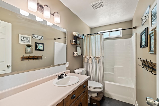 528 W 650 S, Richfield, UT 84701 - bathroom with vanity, shower / bathtub combination with curtain, tile patterned flooring, and a textured ceiling