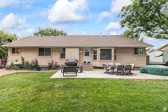 528 W 650 S, Richfield, UT 84701 - rear view of property with entry steps, a patio area, a yard, and stucco siding