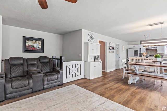 528 W 650 S, Richfield, UT 84701 - living room featuring dark wood-style floors and a ceiling fan