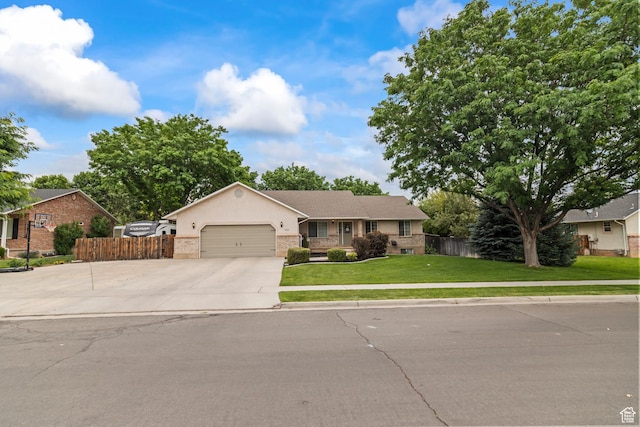 528 W 650 S, Richfield, UT 84701 - ranch-style house featuring an attached garage, concrete driveway, brick siding, and stucco siding