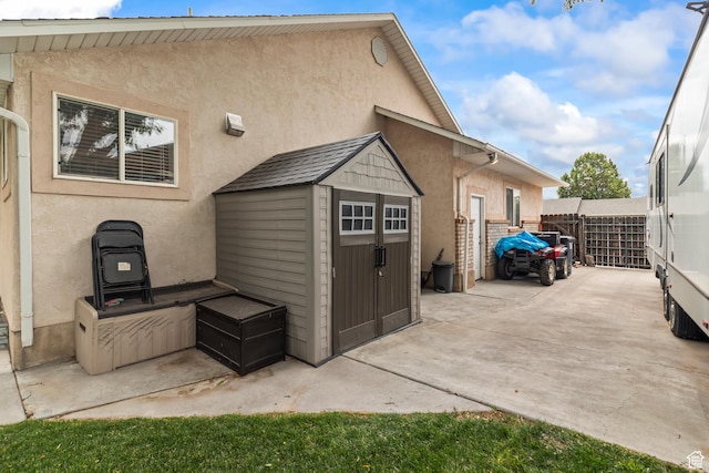 528 W 650 S, Richfield, UT 84701 - rear view of house featuring a patio area, a shed, and stucco siding