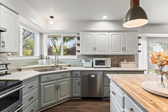 528 W 650 S, Richfield, UT 84701 - kitchen with appliances with stainless steel finishes, butcher block countertops, gray cabinets, tasteful backsplash, and recessed lighting