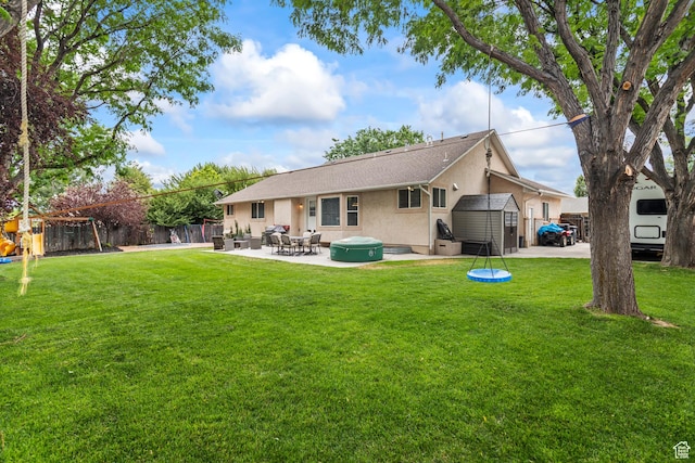 528 W 650 S, Richfield, UT 84701 - back of house featuring a storage shed, stucco siding, and a patio