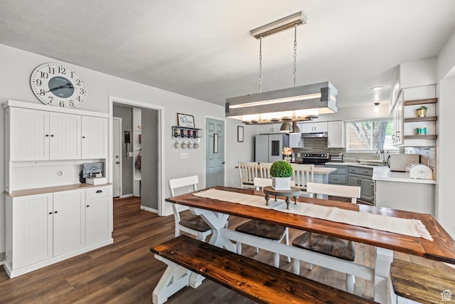 528 W 650 S, Richfield, UT 84701 - dining space with dark wood-style floors and baseboards