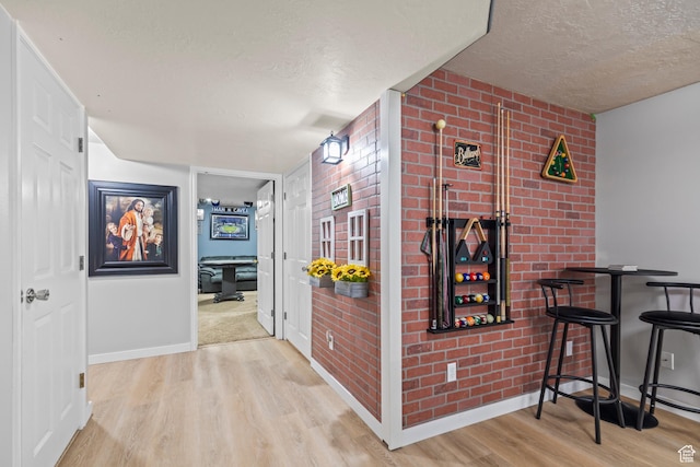 528 W 650 S, Richfield, UT 84701 - corridor with wood finished floors and a textured ceiling