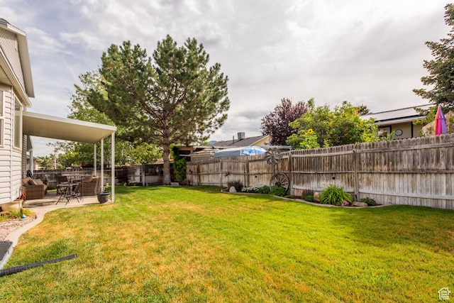 576 Mayo Dr N, Tooele, UT 84074 - fenced backyard featuring a patio