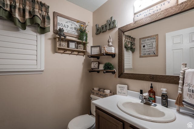 576 Mayo Dr N, Tooele, UT 84074 - half bathroom featuring vanity and toilet