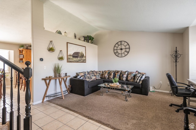 576 Mayo Dr N, Tooele, UT 84074 - living area with light tile patterned floors, stairs, lofted ceiling, and light colored carpet