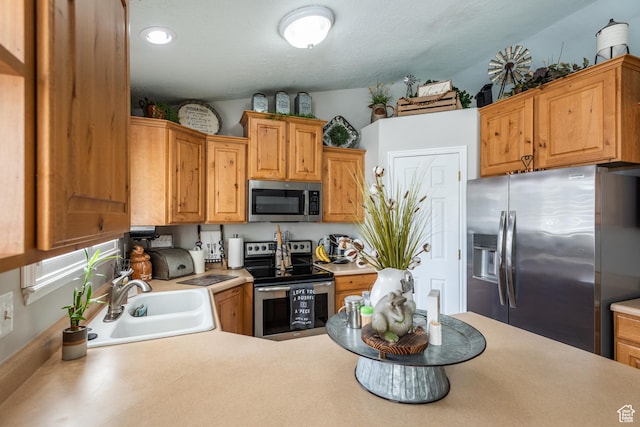 576 Mayo Dr N, Tooele, UT 84074 - kitchen with appliances with stainless steel finishes, light countertops, and recessed lighting