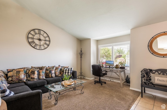 576 Mayo Dr N, Tooele, UT 84074 - tiled living room with an office area, carpet flooring, and vaulted ceiling