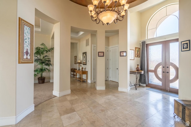 16 N Lions Head Cir, Washington, UT 84780 - entrance foyer featuring a towering ceiling, a chandelier, and french doors