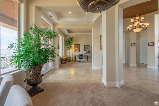 16 N Lions Head Cir, Washington, UT 84780 - hallway with a raised ceiling, light tile patterned flooring, a chandelier, light carpet, and recessed lighting