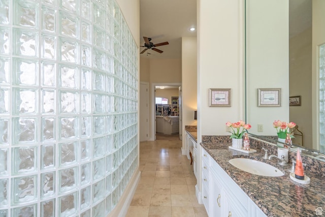 16 N Lions Head Cir, Washington, UT 84780 - bathroom with vanity, tile patterned floors, and a ceiling fan