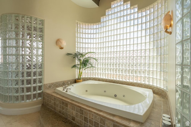 16 N Lions Head Cir, Washington, UT 84780 - bathroom with a tub with jets, tile patterned floors, and healthy amount of natural light