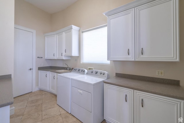 16 N Lions Head Cir, Washington, UT 84780 - laundry room featuring washing machine and clothes dryer, cabinet space, and light tile patterned floors