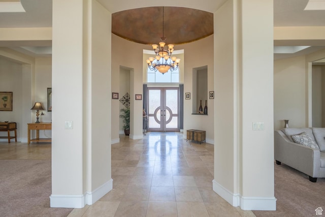 16 N Lions Head Cir, Washington, UT 84780 - foyer entrance with a chandelier and light tile patterned floors