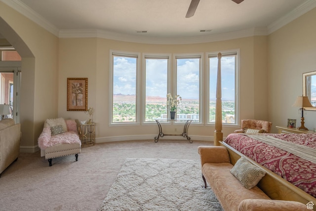 16 N Lions Head Cir, Washington, UT 84780 - carpeted bedroom featuring arched walkways, multiple windows, ornamental molding, and ceiling fan
