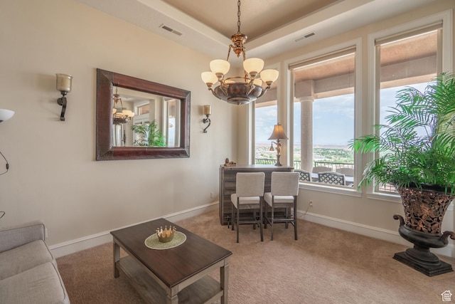16 N Lions Head Cir, Washington, UT 84780 - living room with a chandelier, carpet floors, and a tray ceiling