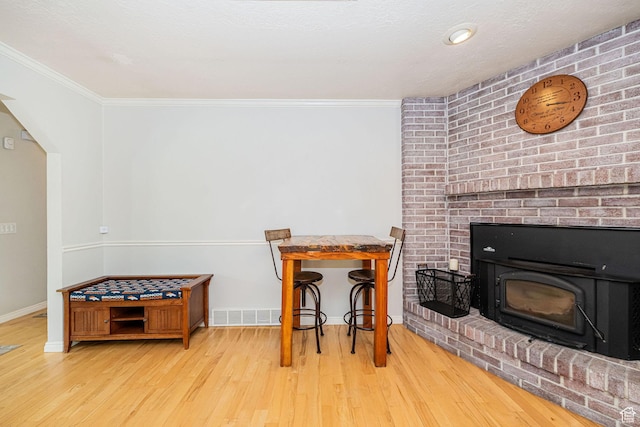 5883 S Jared Way E, South Ogden, UT 84403 - dining space with wood finished floors and ornamental molding