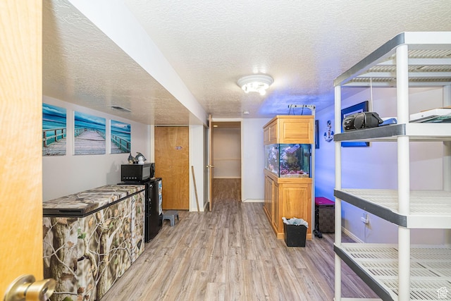5883 S Jared Way E, South Ogden, UT 84403 - corridor with wood finished floors and a textured ceiling