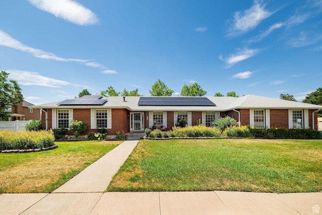 5883 S Jared Way E, South Ogden, UT 84403 - ranch-style house featuring brick siding and roof mounted solar panels