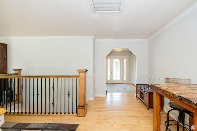 5883 S Jared Way E, South Ogden, UT 84403 - corridor featuring light wood finished floors, ornamental molding, and arched walkways