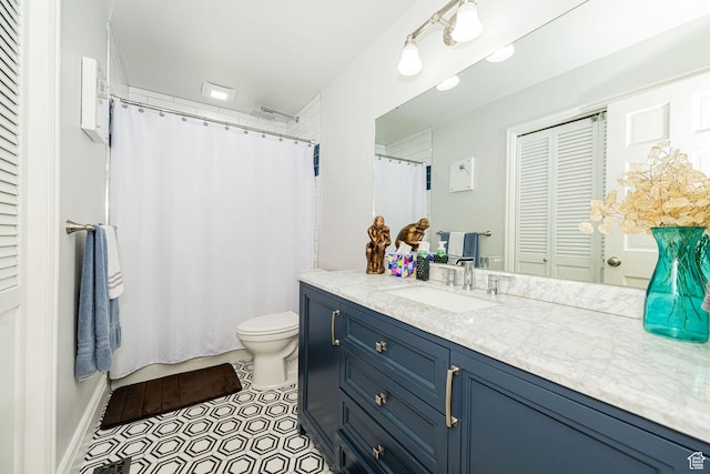 5883 S Jared Way E, South Ogden, UT 84403 - full bathroom featuring vanity, a closet, a shower with shower curtain, and tile patterned flooring