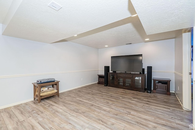 5883 S Jared Way E, South Ogden, UT 84403 - unfurnished living room with a textured ceiling, wood finished floors, and recessed lighting
