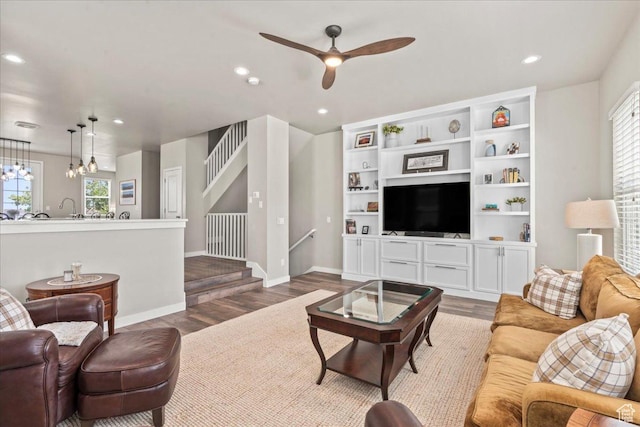 5328 W S Jordan Pkwy S, South Jordan, UT 84009 - living room featuring healthy amount of natural light, wood finished floors, ceiling fan, recessed lighting, and a chandelier
