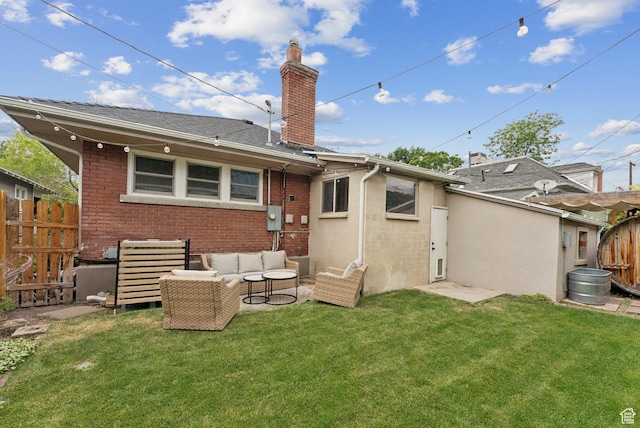 1873 S Lincoln St E, Salt Lake City, UT 84105 - rear view of property featuring outdoor lounge area, a chimney, brick siding, and a shingled roof